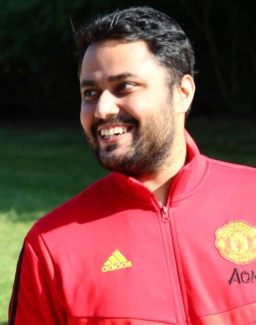 Arjun Tejani smiling outdoors
